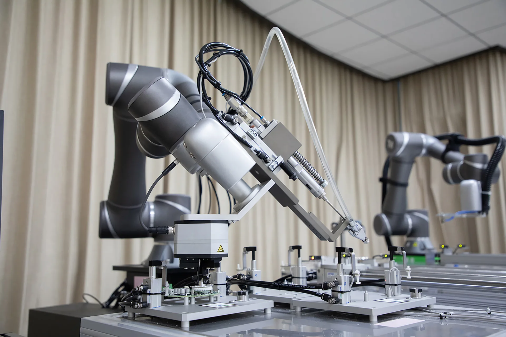 Cobot performing precision assembly